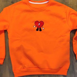 Sad heart bad bunny orange sweater